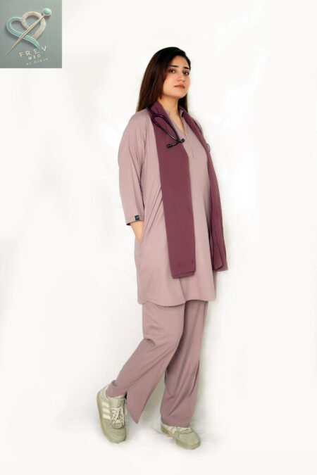 Introducing the FrevMed Modest Scrub Set – crafted for female healthcare professionals who value coverage, comfort, and understated elegance. This thoughtfully designed set features a longer, modest-fit top and a soft, flattering silhouette that moves with you from rounds to routines.